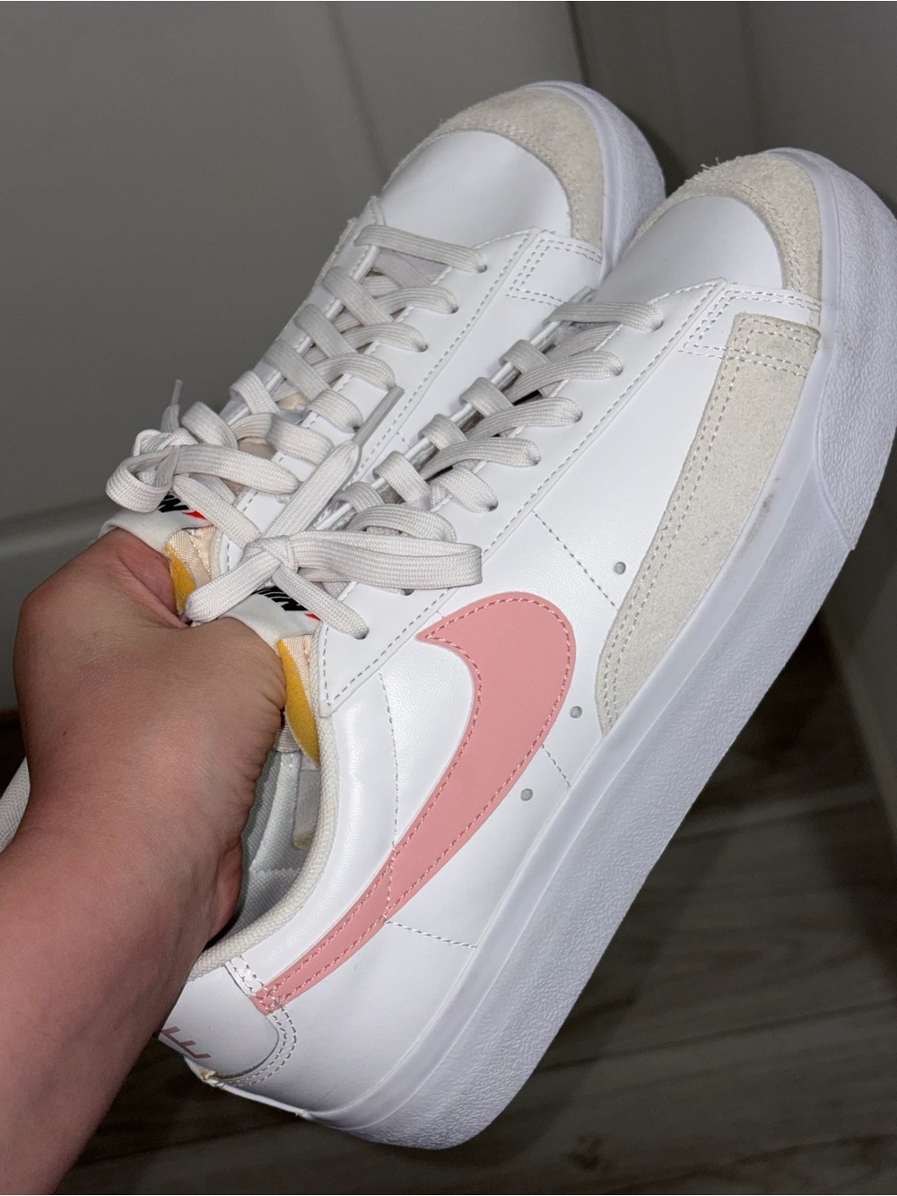 Nike Women's White Sneaker with Pink Swoosh